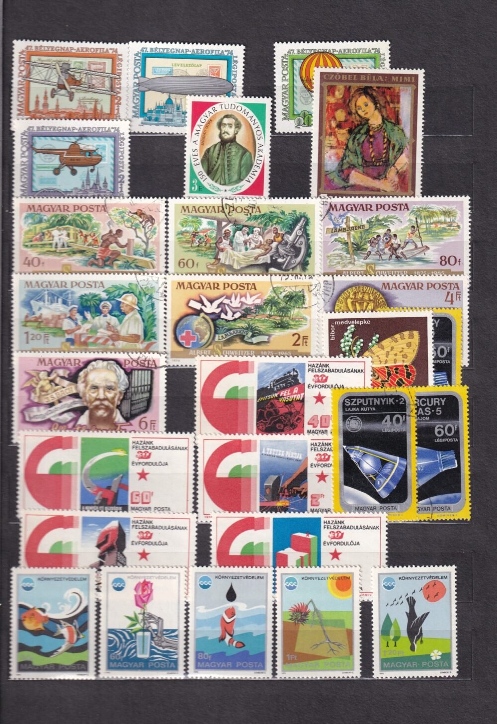 12 lapos berakó (vastag fekete lapokkal), magyar postatiszta bélyegekkel