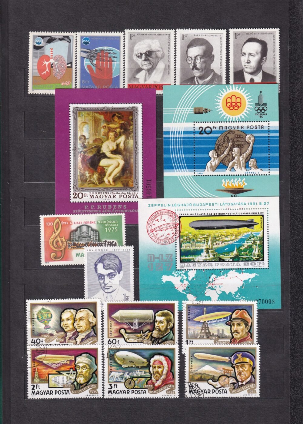 12 lapos berakó (vastag fekete lapokkal), magyar postatiszta bélyegekkel