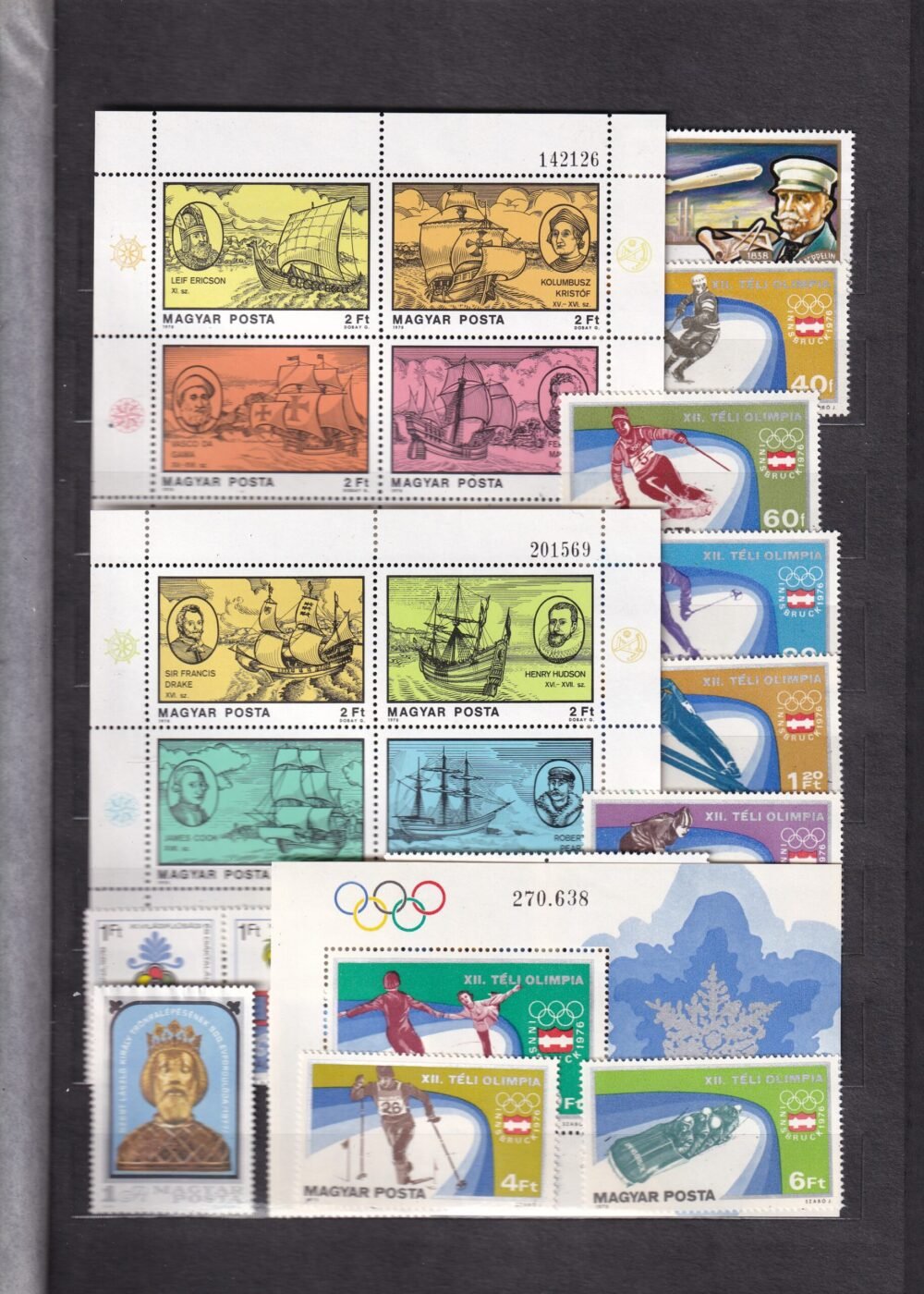 12 lapos berakó (vastag fekete lapokkal), magyar postatiszta bélyegekkel