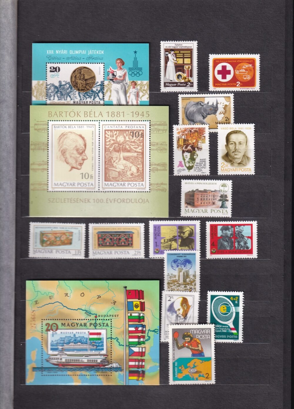 12 lapos berakó (vastag fekete lapokkal), magyar postatiszta bélyegekkel