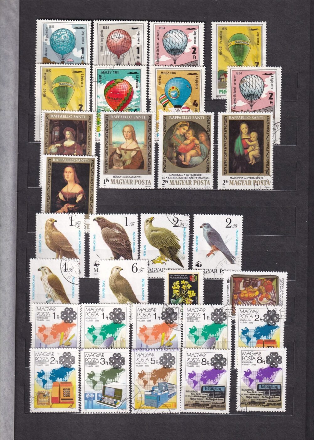 12 lapos berakó (vastag fekete lapokkal), magyar postatiszta bélyegekkel