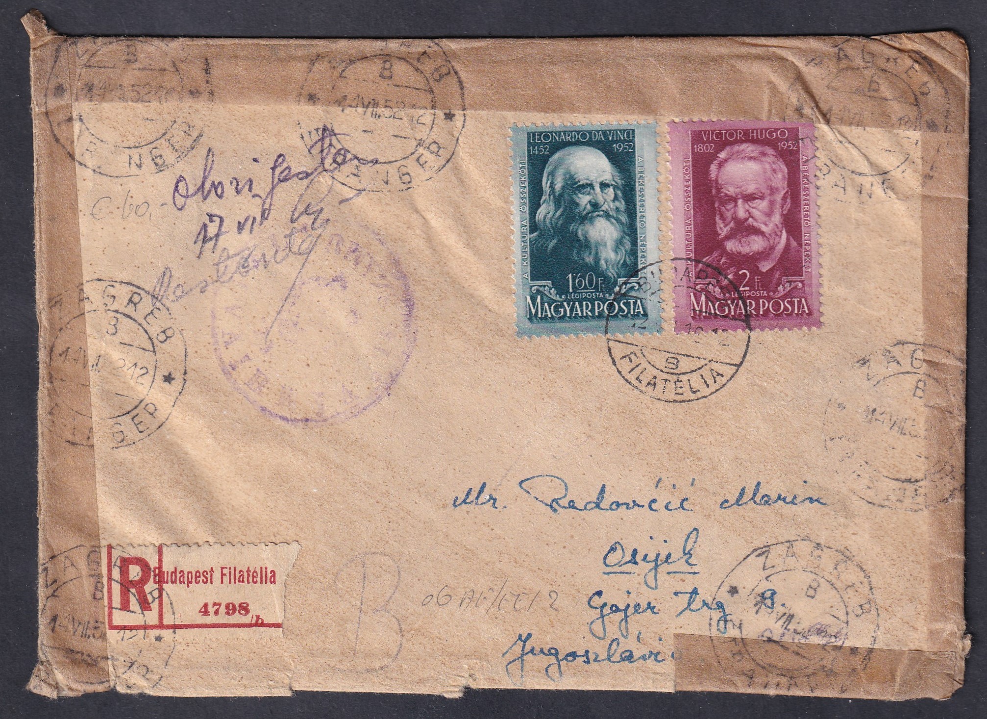 IMG_20260410_0015 1952. Budapest–Eszék ajánlott levél „Budapesti Filatélia” feladótól, többszörös jugoszláv tranzit- és továbbítási bélyegzésekkel (Zágráb, Belgrád), valamint több lila „VIZAT AL…” ellenőrző bélyegzővel, rendkívül látványos postai kezelésű küldemény