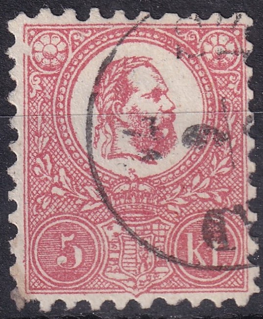 IMG_20260424_0029.9 1871. Kőnyomat 5 kr III. típus – látványos nyomdai rendellenesség, a bal felső rozetta mellett jelentkező festékhiánnyal. A bal alsó sarok elszíneződését korábbi szakértői jelölés okozhatta.