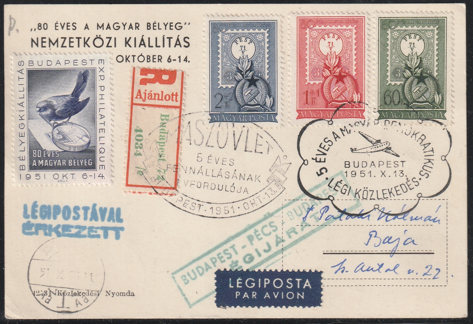 26_7_20260713_0022 1951. „80 éves a magyar bélyeg” kiállítási képeslap a teljes sorral – ajánlott légipostával Bajára feladva, az „5 éves a magyar–szovjet légiközlekedés” alkalmi bélyegzésével.